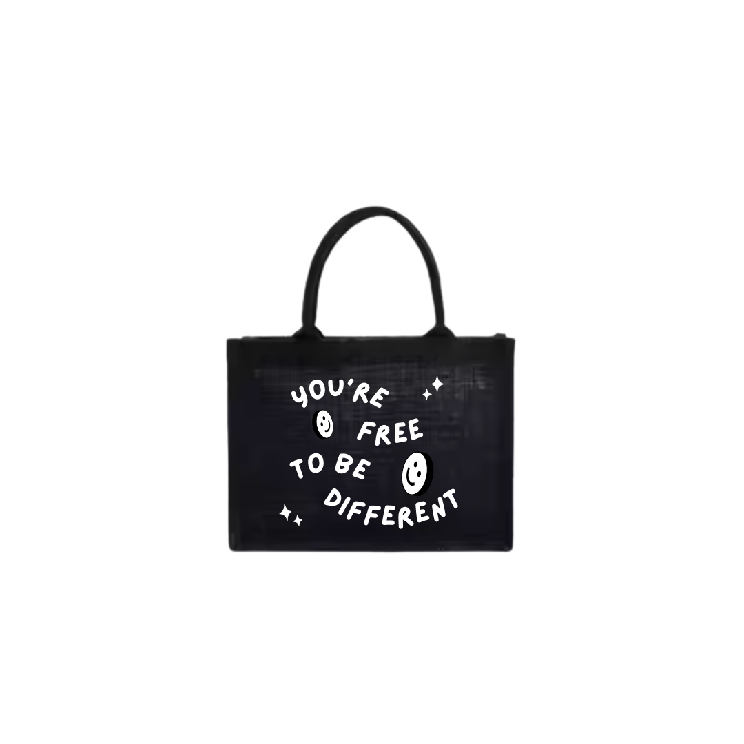 "you're free to be different" beach bag